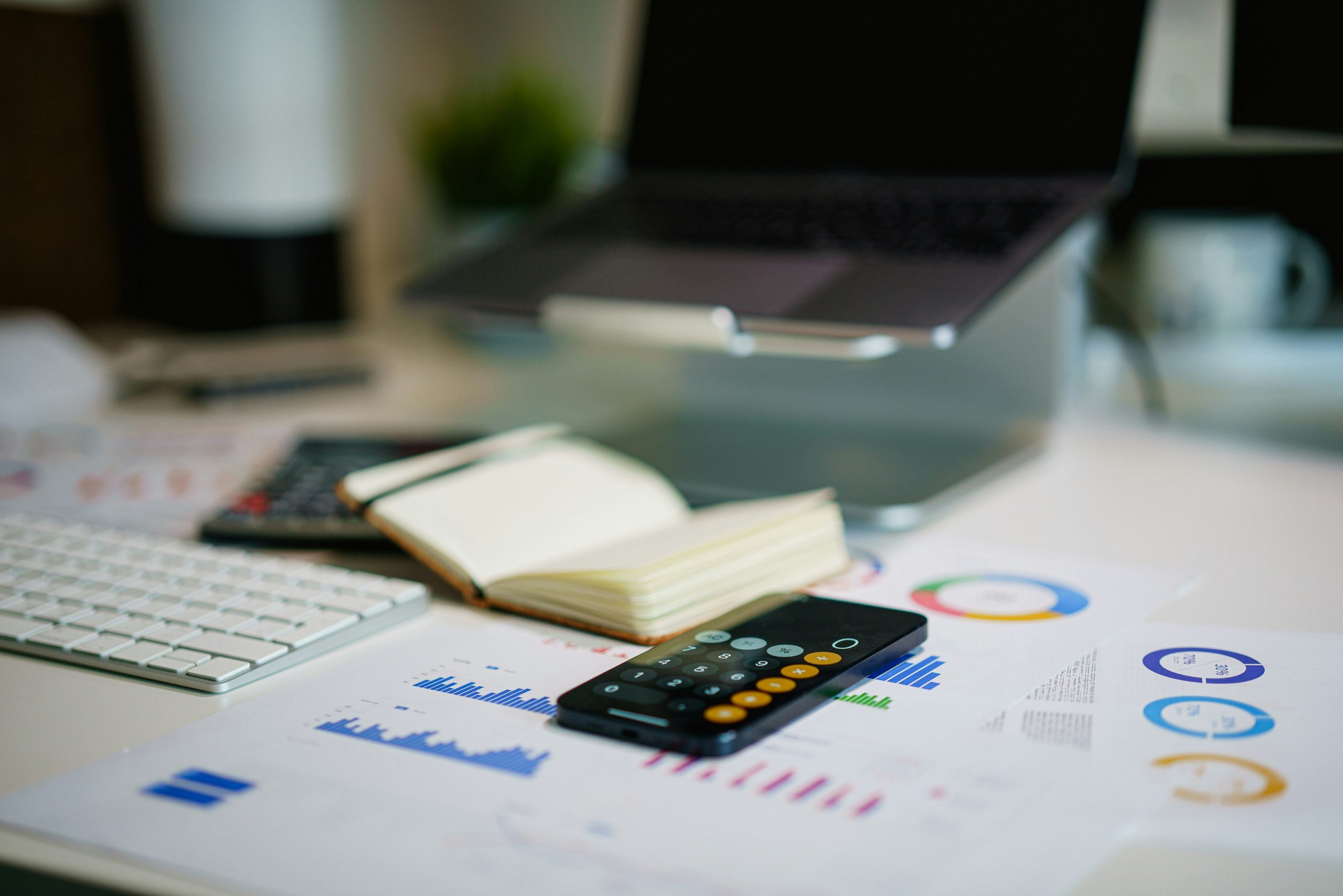 Desk with financial charts